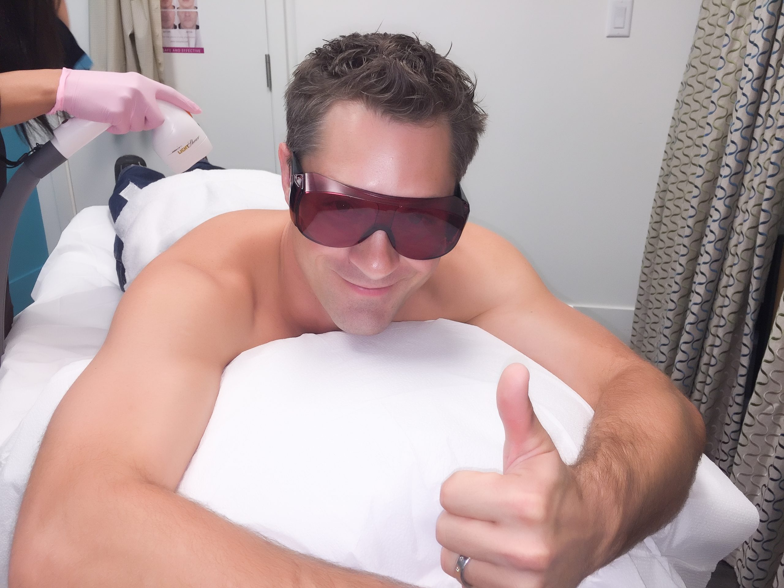 Man receives laser hair removal treatment at MD Wellness Solutions